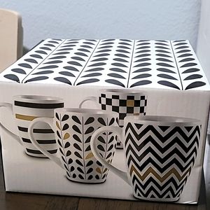 Set of four Macy's mugs. PAI